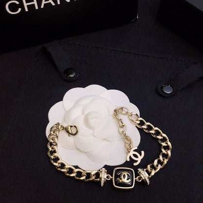 18K  Chanel Black Logo Gold Chain Bracelet