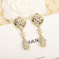 18K  Chanel Cross Rhombus Earrings